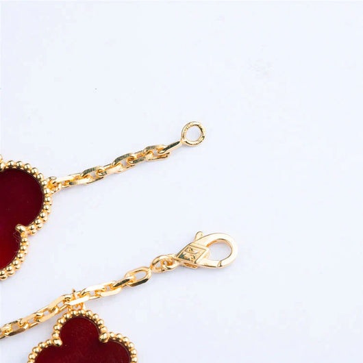 MAGIC CLOVER 5 MOTIFS CARNELIAN TIGER EYE BRACELET