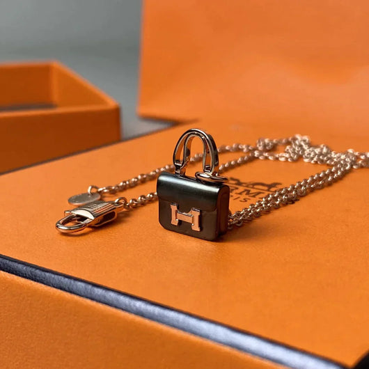 CONSTANCE BLACK PEDANT ROSE GOLD NECKLACE