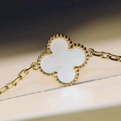 CLOVER 20 MOTIFS WHITE MOP NECKLACE