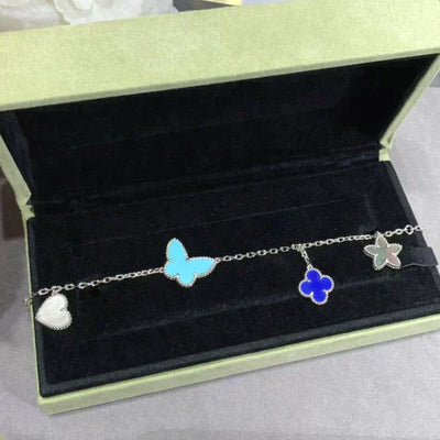 LUCKY SPRING 4 MOTIF BRACELET SILVER