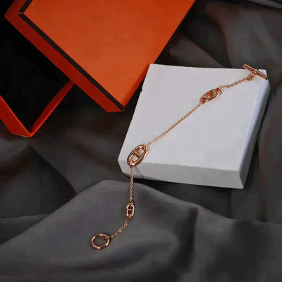DANCRE CHAINE 3 MOTIF ROSE GOLD BRACELET