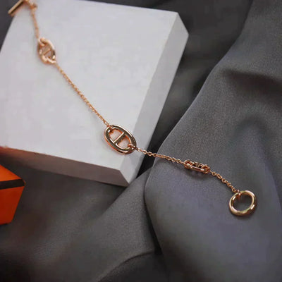 DANCRE CHAINE 3 MOTIF ROSE GOLD BRACELET