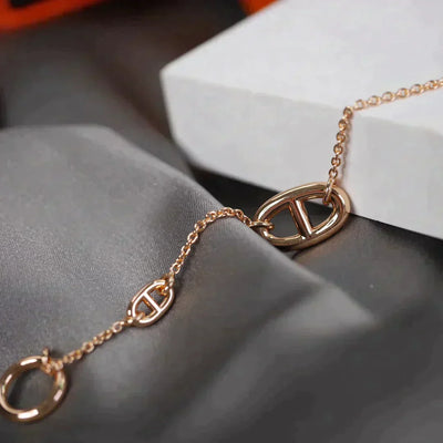 DANCRE CHAINE 3 MOTIF ROSE GOLD BRACELET