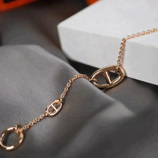 DANCRE CHAINE 3 MOTIF ROSE GOLD BRACELET