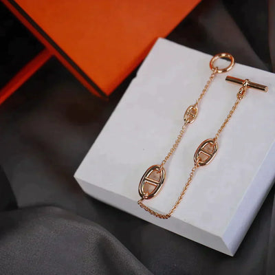 DANCRE CHAINE 3 MOTIF ROSE GOLD BRACELET