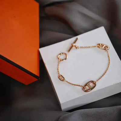 DANCRE CHAINE 3 MOTIF ROSE GOLD BRACELET