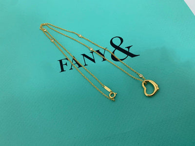 Silver alloy - 14k gold plated ( no box )