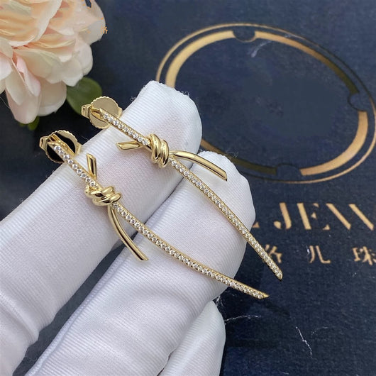 KNOT DROP EARRINGS IN GOLD WITH DIAMONDS