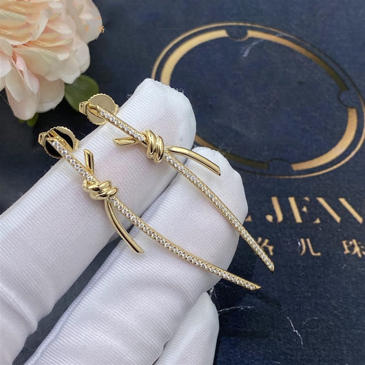 KNOT DROP EARRINGS IN GOLD WITH DIAMONDS
