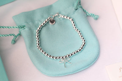 STERLING SILVER BOW BEAD BRACELET