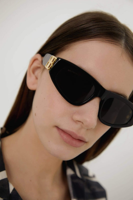 Balenciaga black cat-eye BB sunglasses - Lux Studios