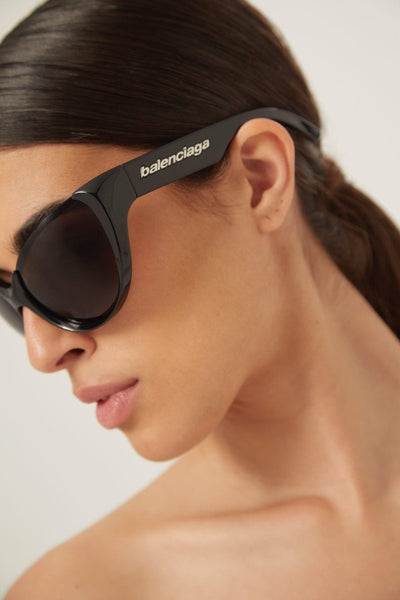 Balenciaga black wrap around sunglasses - Lux Studios
