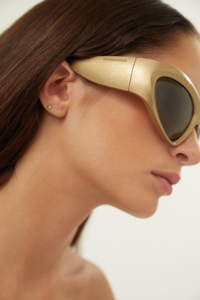 Balenciaga bold wrap around gold sunglasses - Lux Studios