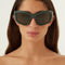 Balenciaga bold wrap around green sunglasses
