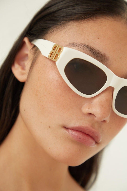 Balenciaga white and gold cat-eye BB sunglasses - Lux Studios