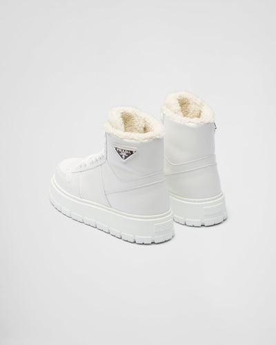 Leather and shearling high-top sneakers