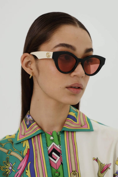 Gucci cat eye black and cream sunglasses - Lux Studios