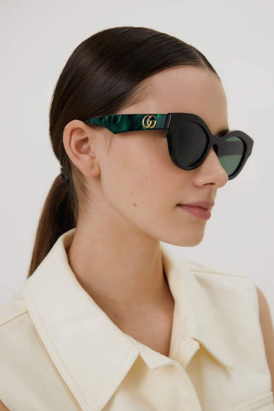 Gucci cat eye black and green sunglasses - Lux Studios