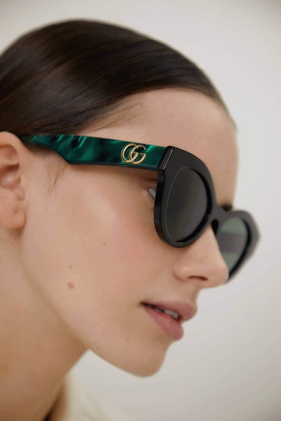 Gucci cat eye black and green sunglasses - Lux Studios