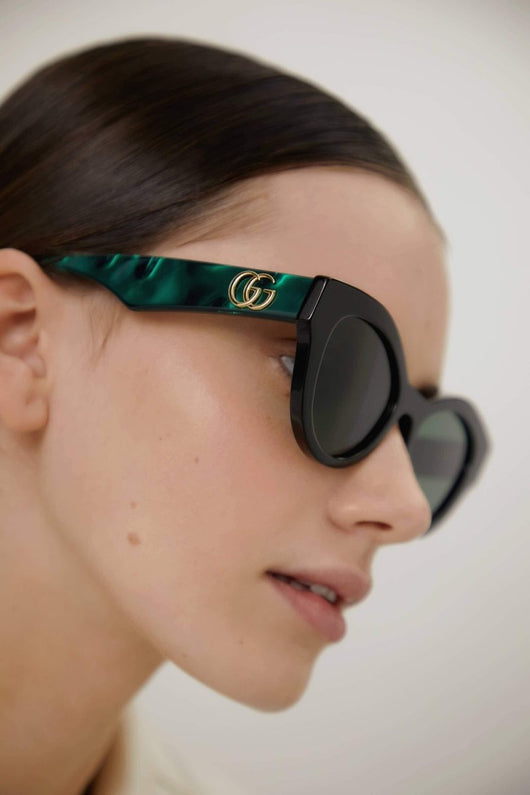 Gucci cat eye black and green sunglasses - Lux Studios