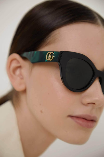 Gucci cat eye black and green sunglasses - Lux Studios