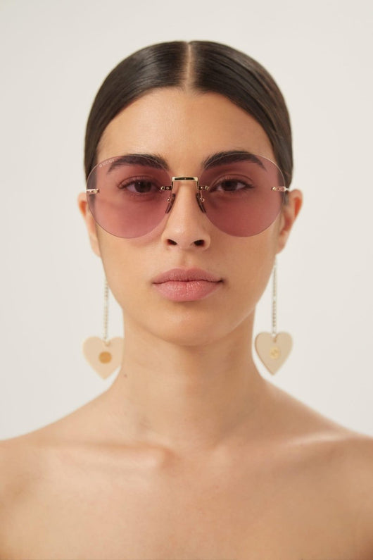Gucci chain gold round sunglasses with heart charms - Lux Studios