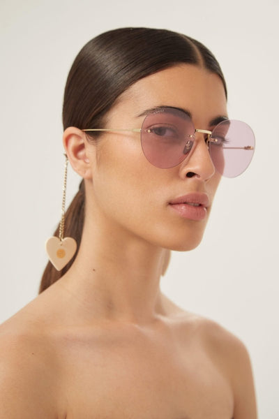 Gucci chain gold round sunglasses with heart charms - Lux Studios