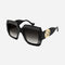 Gucci femenine black sunglasses with integrated GG logo