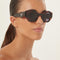 Prada havana and purple sunglasses