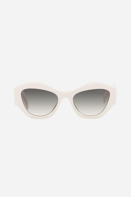 Prada oval white sunglasses featuring iconic logo - Lux Studios