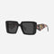 Prada squared sunglasses featuring the signature logo triangle