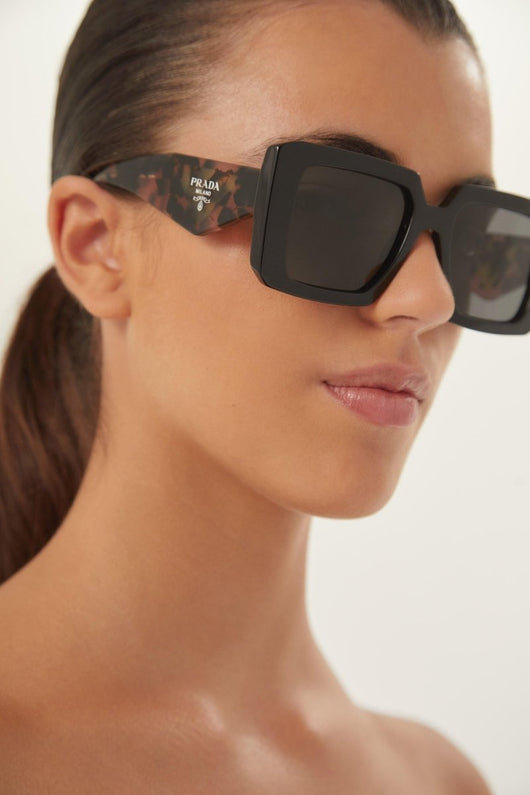 Prada squared sunglasses featuring the signature logo triangle - Lux Studios
