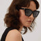 Saint Laurent cat-eye black sunglasses featuring YSL logo
