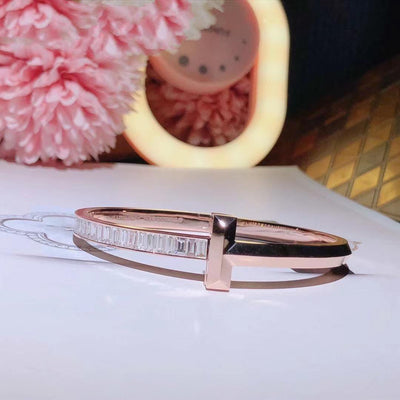 WIDE HINGED BANGLE ROSE GOLD WITH BAGUETTE DIAMONDS