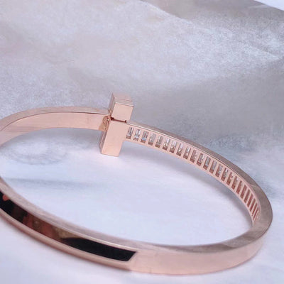 WIDE HINGED BANGLE ROSE GOLD WITH BAGUETTE DIAMONDS