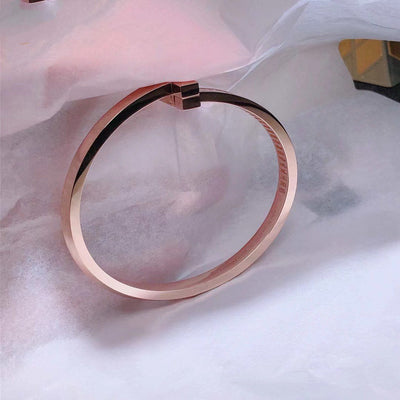WIDE HINGED BANGLE ROSE GOLD WITH BAGUETTE DIAMONDS
